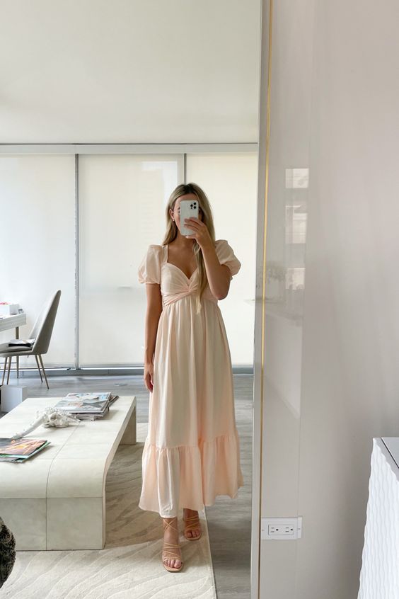 a blush maxi dress with a knotted bodice, puff sleeves, a ruffle skirt and nude lac eup shoes is adorable for spring