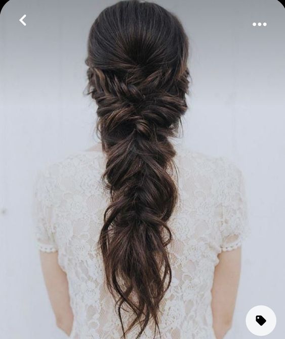 a braid and ponytail and some additional braids over it plus some textured hair is a cool idea for a bride