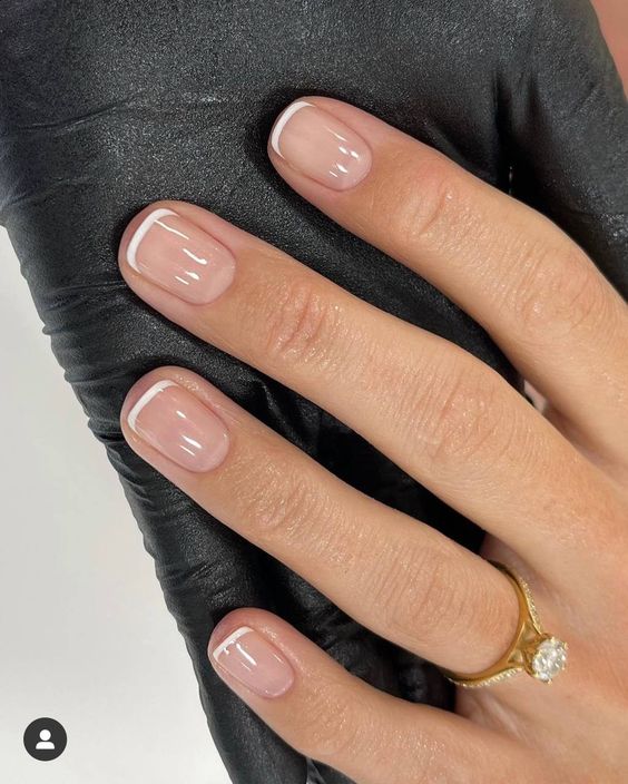 a classic French manicure on short nails is always a good idea, it's almost micro French that is so trendy now