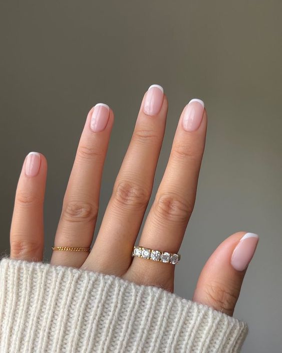 a classic French manicure on squoval nails is a very stylish and amazing idea for any outfit