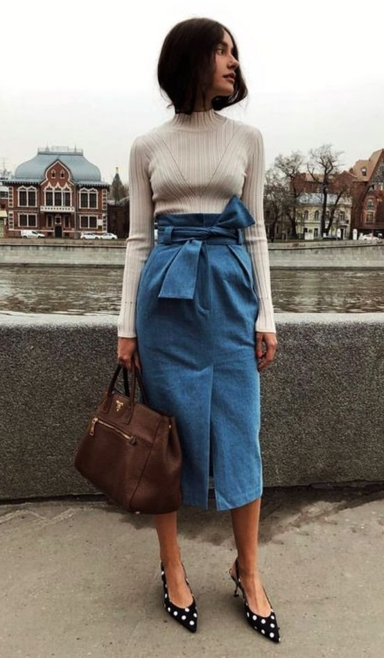 a creative and girlish look with a neutral turtleneck, a blue denim pencil midi skirt, polka dot shoes and a brown bag