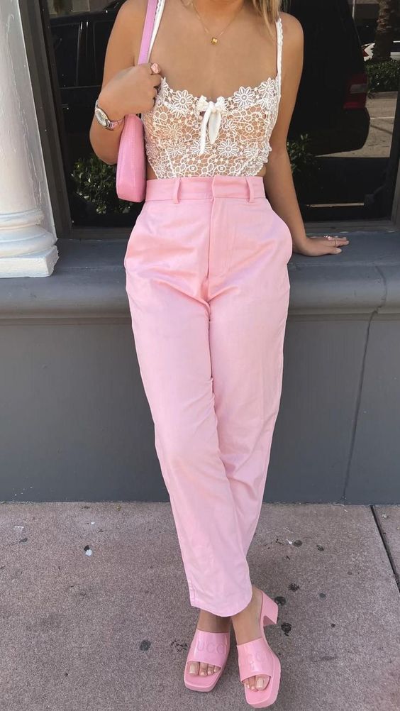 a girlish Easter look with a white lace top, pink pants, pink heeled mules, a pink baguette bag
