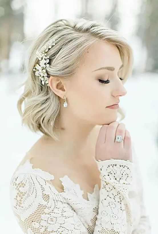 A long blonde bob with a lovely crystal hair pin is a chic and lovely idea for a vintage inspired and romantic bridal look