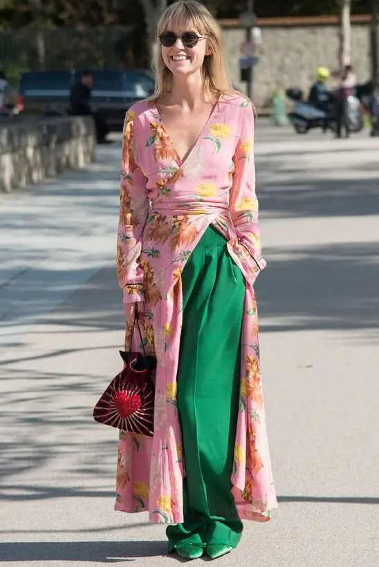 a pink floral kimono, apple grene wideleg pants, matching shoes and a bright emberoidered bag