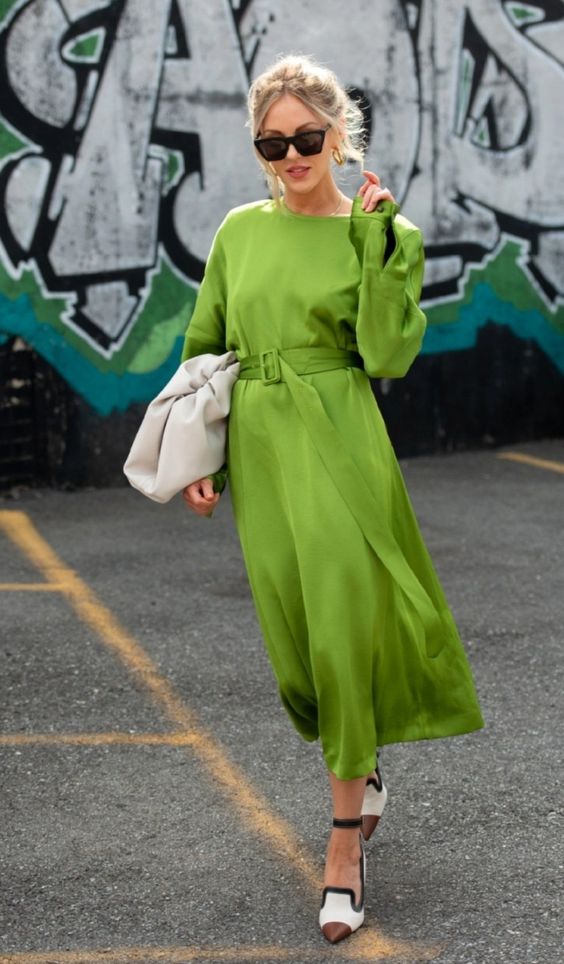 a plain green midi dress with a sash, color block shoes and a white bag are a cool and trendy look for a shower