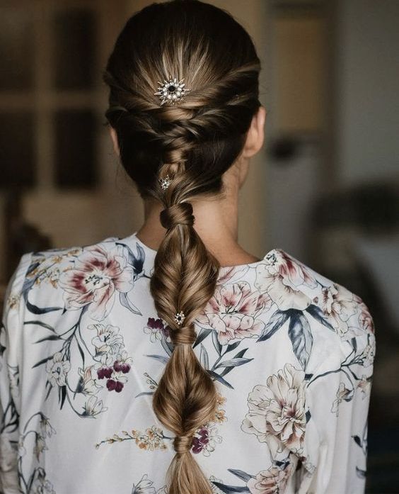 a pretty twisted bubble braid with a double twisted halo and some embellished hair pins is amazing