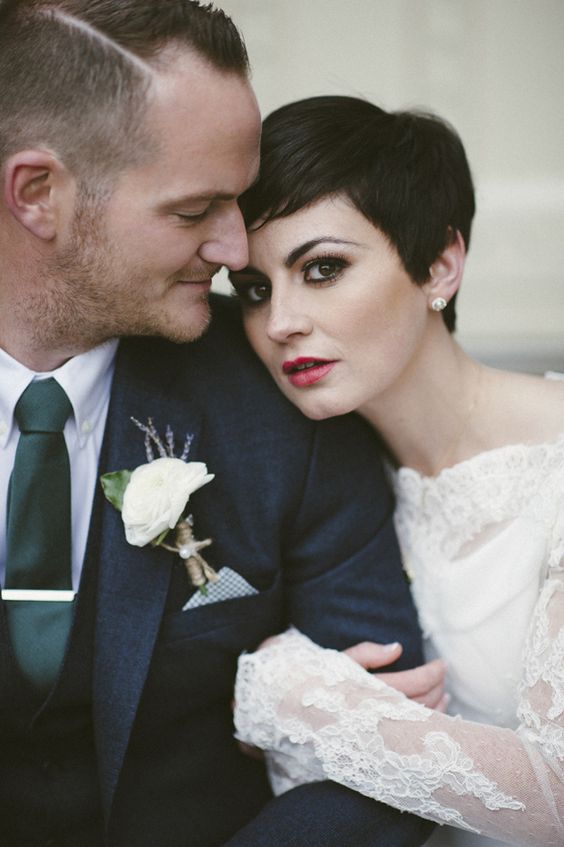 a short dark brunette pixie haircut is a cool and catchy hairstyle for a wedding, it doesn't require much styling