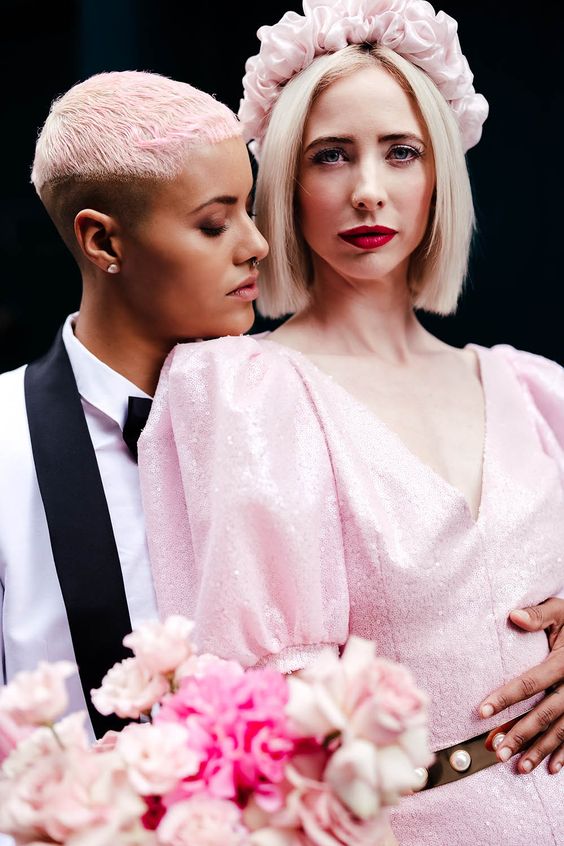 a short pixie styled as an undercut and done in bubble gum pink is amazing for a wedding