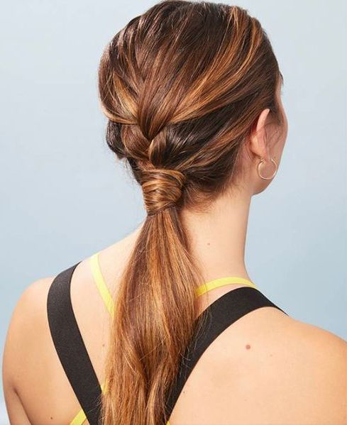 a sleek top plus a braid into a low ponytail are a cool and catchy combo for a workout, works on medium and long hair