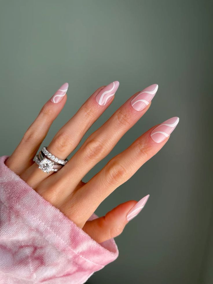 a super cute and lovely pink and white swirl manicure like this one will be a gorgeous solution for spring and summer