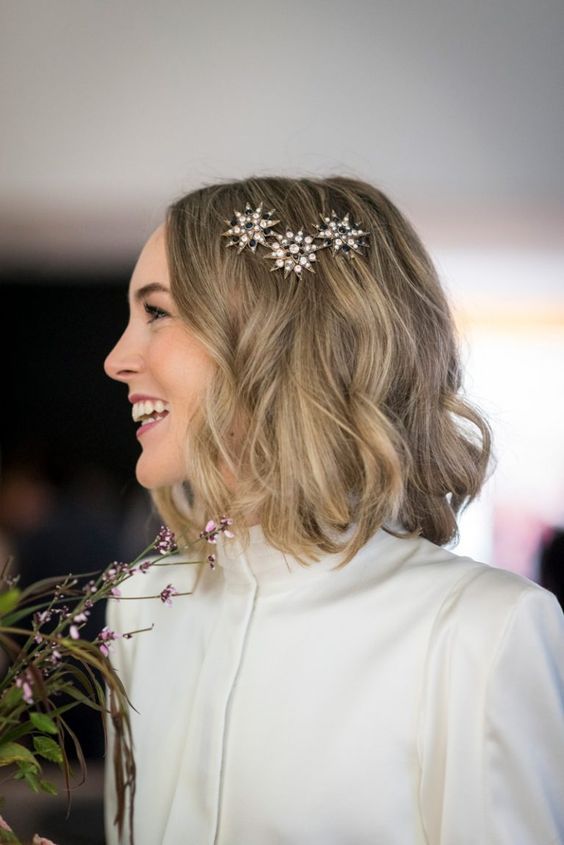 a wavy long bob accented with shine rhinestone stars is a super cool idea for a wedding