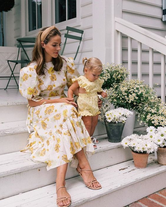 a ywhite and yellow floral midi dress, a yellow headband and nude lace up sandals are great for spring and summer