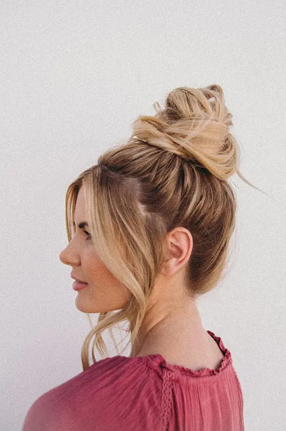 an effortless top knot with volume on top and long face-framing hair is a lovely idea for every day if you have long hair