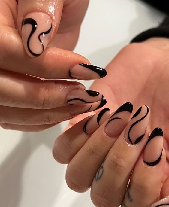 an elegant and bold black and blush swirl nail art is utlimate for many occasions, it looks gorgeous