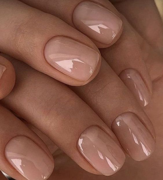 classic glossy nude nails are absolutely perfect and they match any outfit
