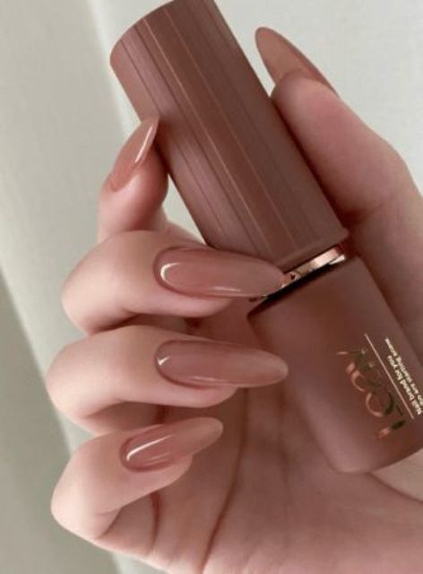 elegant long almond brown nails are a chic and stylish idea for an Old Money look