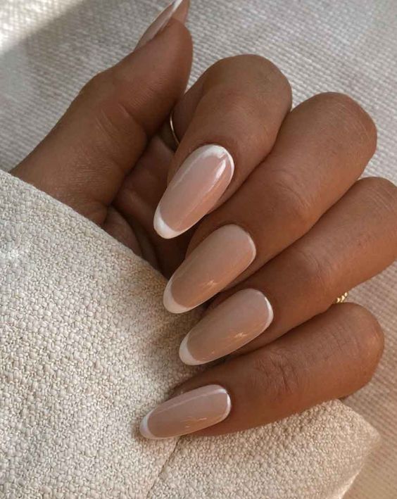 long almond nails done with mciro French are a fresh and trendy take on classic French nails