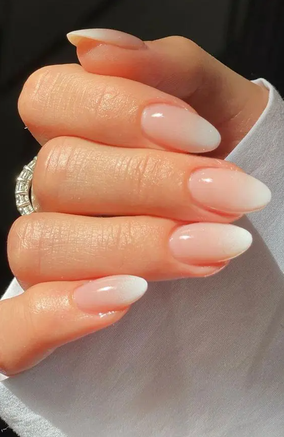 ombre almond-shaped French nails look Old Money and are a trendy version of classic French nails