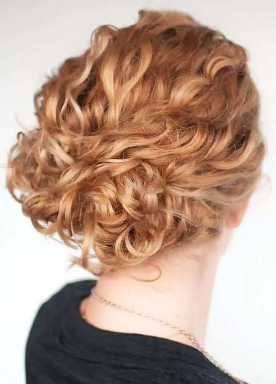 a beautiful and easy wavy updo with a wavy top and a beautiful ginger shade is a cool idea for a wedding