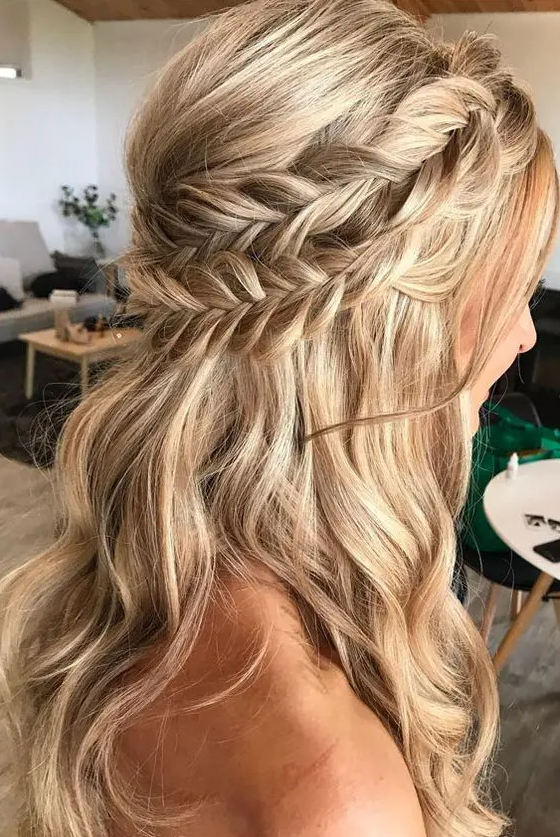 a classy boho half updo with a double braided halo and waves down plus a bump requires no accessories as it’s gorgeous itself