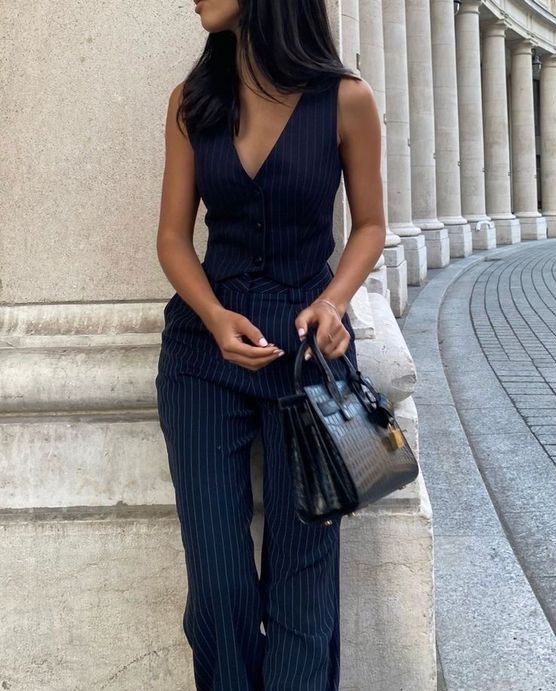 a classy navy pinstripe suit with a vest and trousers is a super chic and trendy idea for graduation and for work, too