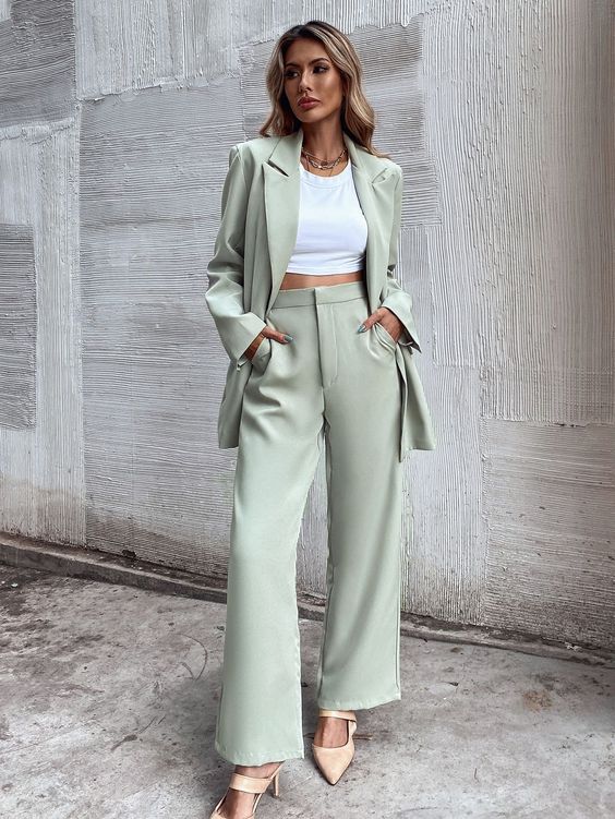 a sage green pantsuit, a white crop top, nude shoes and soem necklaces are a lovely outfit for graduation