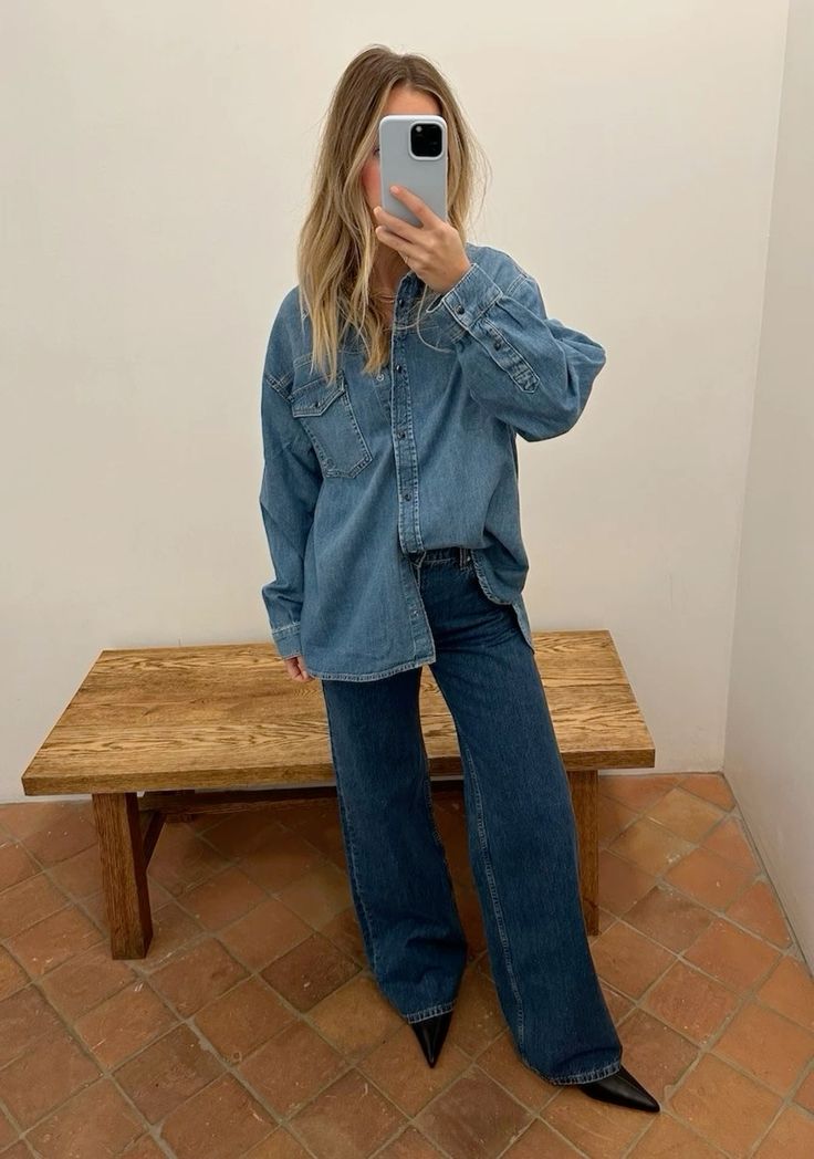 a simple and cool look with a blue denim shirt and navy jeans plus pointed toe heels is amazing for spring