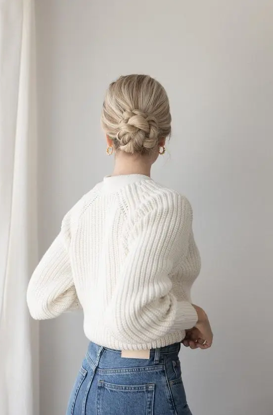 A stylish braided low bun with a volume on top is a cool idea for long hair, it looks party appropriate and lovely