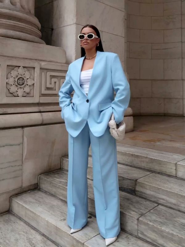 a stylish graduation look with a blue pantsuit, an oversized blazer, palazzo pants, white shoes, a top and a bag is amazing