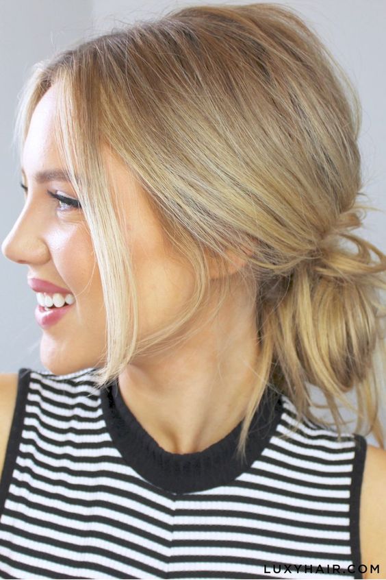 a super messy low bun with a messy top and face-framing bangs is a cool idea for every day, it looks cute and lovely