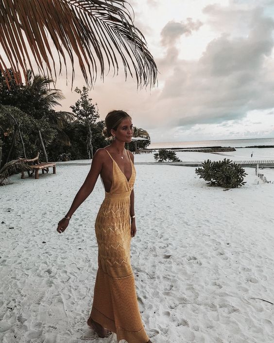 a yellow boho lace maxi dress is a cool soluton for a boho beach wedding, great for a hot day one