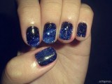 midnight and electric blue celestial nails with galaxies will be amazing for a bold and cool NYE party