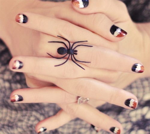rust, white and black nails inspired by spiders are a very creative idea for Halloween