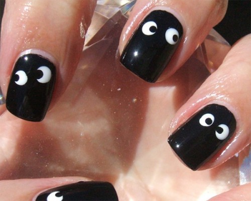 glossy black nails with googly eyes are great for Halloween, these are a perfect solution to rock