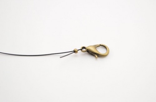 Simple DIY Beaded Bracelet With A Charm