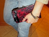 red and black lace clutch