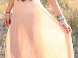 a white crochet crop top and a blush maxi skirt with a silver coin belt for a slight boho feel