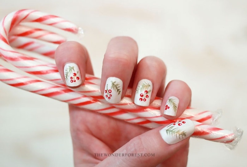 Picture Of cool diy holiday nail art with spruce and berries  1