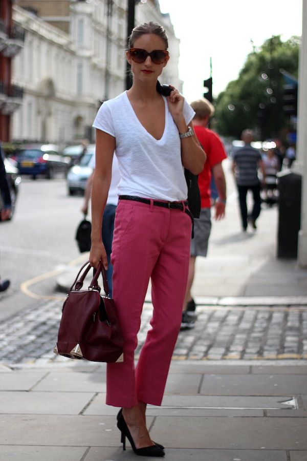 a wihte top, fuchsia pants, black shoes and a burgundy bag for a bold summer look