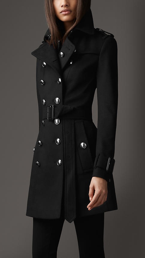 a classic double-breast black over the knee trench by Burberry will never go out of style