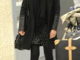 a black and white polka dot mini dress, a black scarf, boots, a short coat and an embellished bag