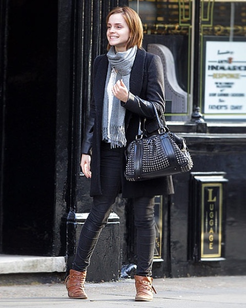 black leather pants, a black coat, a striped scarf, brown booties and a black embellished bag