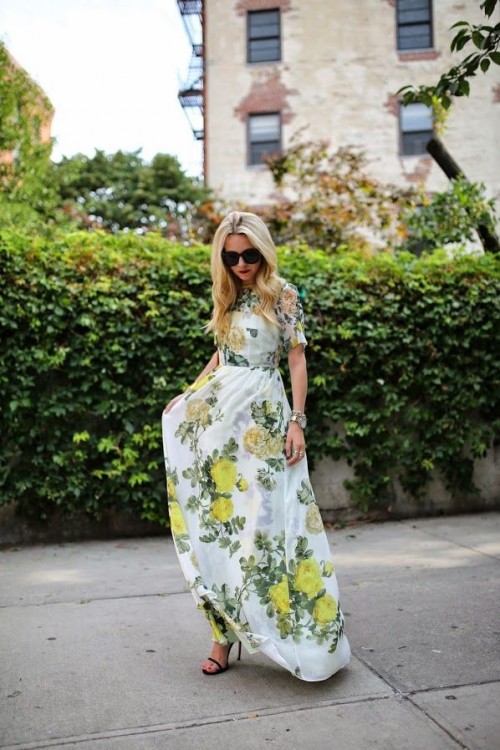 a white realistic floral pattern maxi dress and black minimalist heels for a special occasion or party
