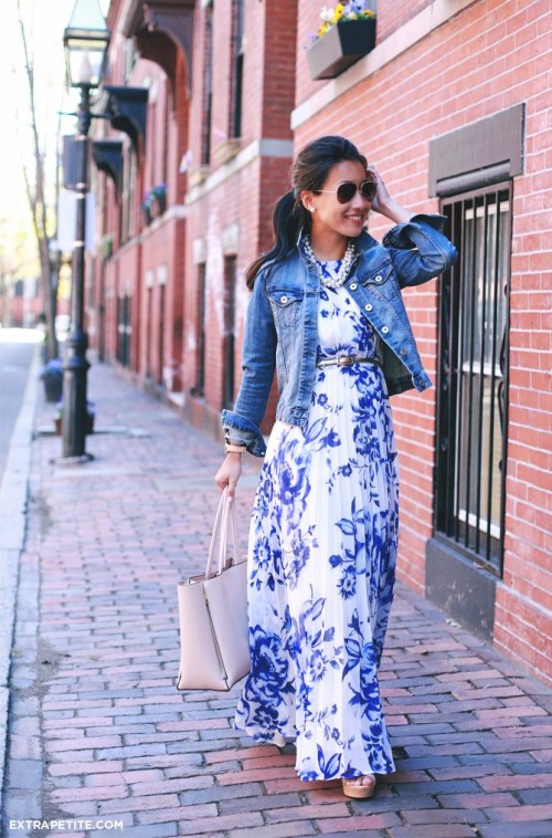 a bright white and blue maxi dress with a floral print, a denim jacket and a neutral tote for a chic everyday look