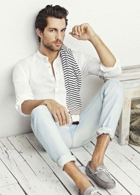 a white shirt, bleached jeans, grey moccasins and a striped pullover for a simple and chic holiday look