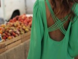 an apple green mini dress with an open back and criss cross straps is all you need for a chic look