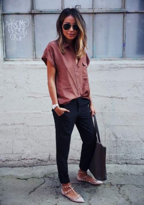 a simple and clean look with black pants, a dusty pink button down with no sleeves, blush spiked flats and a black tote