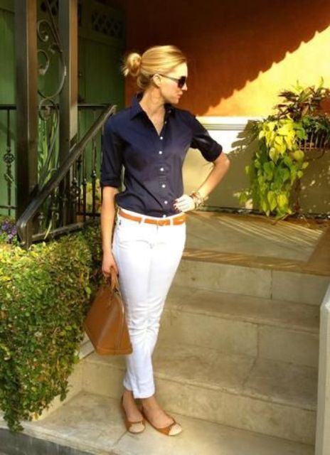 a simple and casual look with white skinnies, a navy button down, a brown bag and flats plus a belt