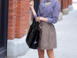 a blue and white gingham button down, a statement pearl necklace, a black tote and blush and black flats