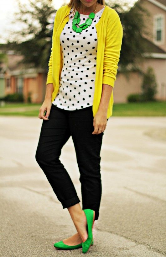 Black skinnies, a polka dot top, a bright yellow cardigan, bright green flats and a matching necklace